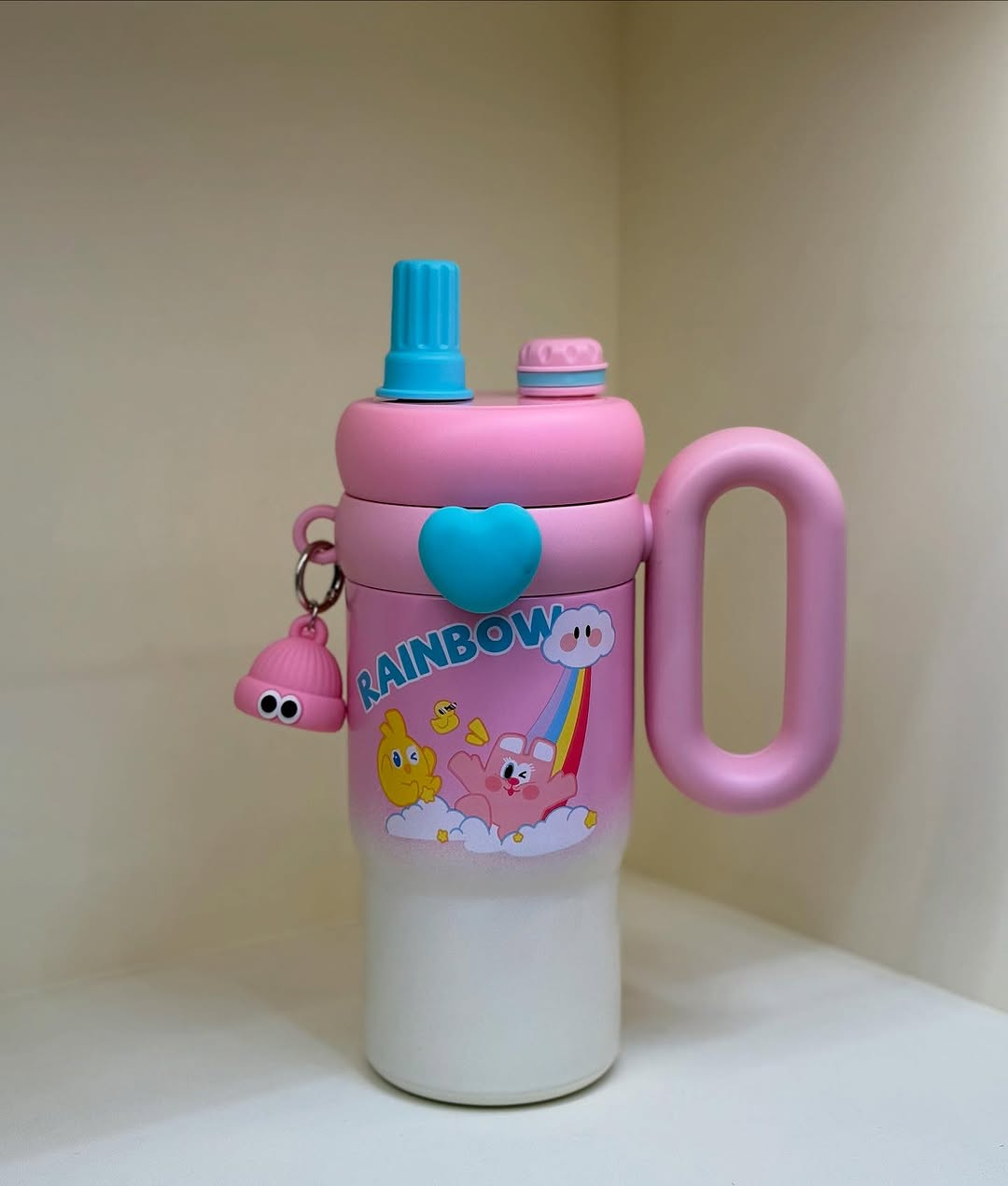 🔔 Limited Time OFFER! Personalize this product for FREE  Rainbow Sip Tumbler – 1000ML | Cute Kawaii Style with Dual Lids & Handle 🌈🧸💧